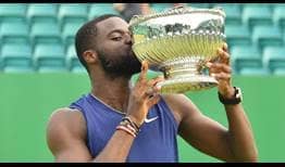 Frances Tiafoe celebrates his first career grass-court title at the ATP Challenger Tour event in Nottingham.
