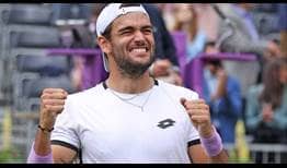Matteo Berrettini does not face a break point in the cinch Championships final, beating Cameron Norrie in three sets for the title.