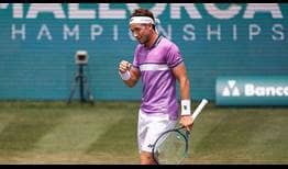 Casper Ruud defeats Gilles Simon in Mallorca on Monday.
