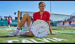 Daniil Medvedev claims the Mallorca Championships trophy to win his first tour-level grass-court title.