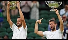 Nikola Mektic (right) and Mate Pavic became the first all-Croatian team to win the Wimbledon doubles trophy on Saturday.