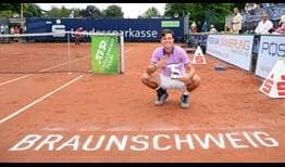 Daniel Altmaier celebrates his maiden ATP Challenger title in Braunschweig, Germany.