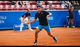 Second seed Cristian Garin overcomes Pedro Martinez on Wednesday in Bastad to reach the quarter-finals.