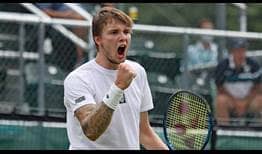 Top seed Alexander Bublik defeats Ivo Karlovic in three sets at the Hall of Fame Open in Newport. 