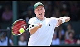Jenson Brooksby reaches his first tour-level semi-final in his grass-court debut at the Hall of Fame Open in Newport.