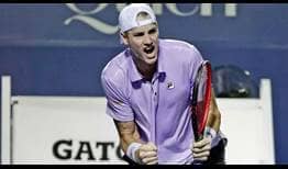 Second seed John Isner celebrates beating Evgeny Donskoy on Wednesday in Los Cabos.