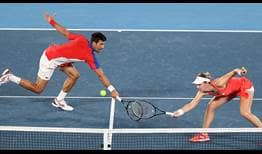 Novak Djokovic and Nina Stojanovic defeat Kevin Krawietz and Laura Siegemund on Thursday in Tokyo.