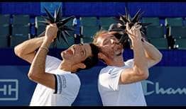  Marcelo Arevalo and Matwe Middelkoop defeat Ivan Dodig and Austin Krajicek on Friday at the Winston-Salem Open to lift the trophy.