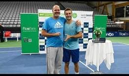 Liam Broady lifts his first ATP Challenger trophy, alongside coach Dave Sammel, prevailing in Biel, Switzerland.