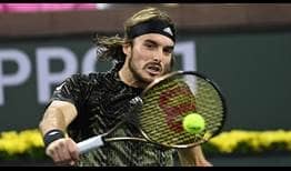 Stefanos Tsitsipas recovers from a set down for the second match running at Indian Wells to post a fourth-round win over Alex de Minaur.