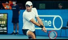 Aslan Karatsev keeps alive his hopes of qualifying for the Nitto ATP Finals on Saturday in Moscow.