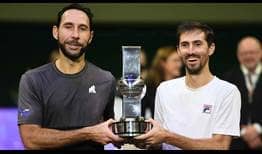 Santiago Gonzalez and Andres Molteni celebrate winning the Stockholm doubles title.