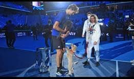 Alexander Zverev celebrates winning the Nitto ATP Finals title with his dogs. 