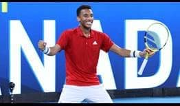 Felix Auger-Aliassime smiles after helping guide Canada to ATP Cup glory on Sunday in Sydney.
