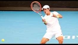Soonwoo Kwon saves one match point to beat fifth seed Lloyd Harris on Tuesday in Adelaide. 