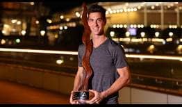 Thanasi Kokkinakis claims his first ATP Tour title in Adelaide.