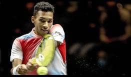 Felix Auger-Aliassime moving past Cameron Norrie in Rotterdam on Friday
