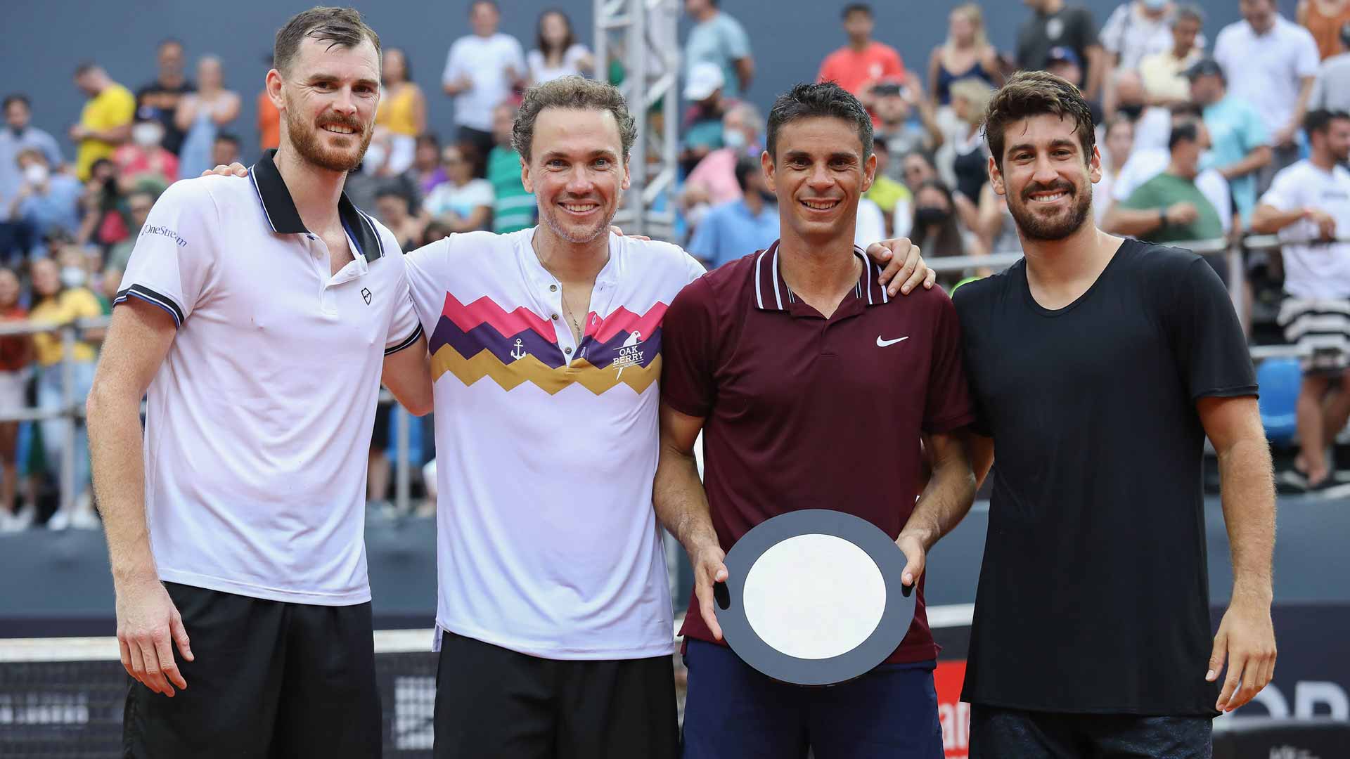 <a href='https://www.atptour.com/en/players/jamie-murray/mc81/overview'>Jamie Murray</a>, <a href='https://www.atptour.com/en/players/bruno-soares/s938/overview'>Bruno Soares</a> and <a href='https://www.atptour.com/en/players/orlando-luz/lf26/overview'>Orlando Luz</a> (far right) celebrate the career of <a href='https://www.atptour.com/en/players/rogerio-dutra-silva/sc73/overview'>Rogerio Dutra Silva</a> (middle right) following the Brazilian's final match on Wednesday.