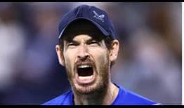 Andy Murray fires himself up on his way to victory in Dubai on Monday.
