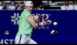 John Isner rallies from a break down in the third set to defeat Fernando Verdasco on Monday evening in Acapulco.