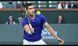 Carlos Alcaraz is in the zone as he hits a volley against Cameron Norrie in Indian Wells on Thursday. 