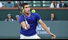 Carlos Alcaraz is in the zone as he hits a volley against Cameron Norrie in Indian Wells on Thursday.