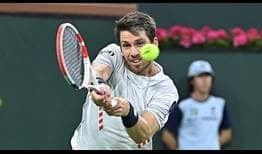 Cameron Norrie drives a backhand through the court against Carlos Alcaraz on Thursday in Indian Wells. 