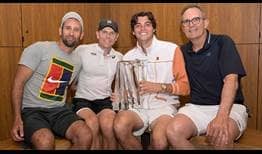 Taylor Fritz celebrates his Indian Wells title with his team (from L to R) Wolfgang Oswald, Michael Russell and Paul Annacone.