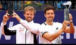 Kevin Krawietz and Andreas Mies celebrate their sixth tour-level title together at the BMW Open by American Express in Munich on Sunday.