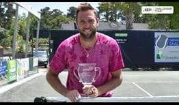 Jack Sock celebrates his first ATP Challenger title of 2022 in Savannah.