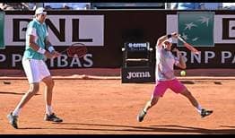 John Isner and Diego Schwartzman advance to the final at the Internazionali BNL d'Italia in Rome on Saturday.