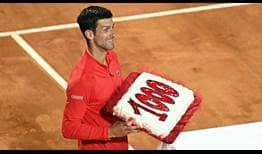 Novak Djokovic celebrates his 1,00th match win with a special on-court presentation.