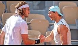 Stefanos Tsitsipas and Rafael Nadal train at Roland Garros on Wednesday ahead of the season's second major.