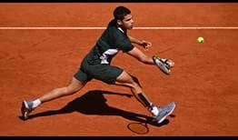 Carlos Alcaraz enters Roland Garros on a 10-match win streak following titles in Barcelona and Madrid.