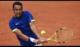 Hugo Dellien in action against Dominic Thiem in the first round at Roland Garros on Sunday.