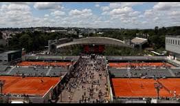 Play resumes on Monday at Roland Garros after a two-hour and eight-minute suspension due to rain.