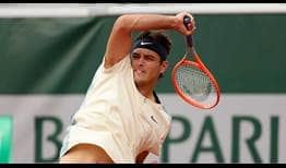 Taylor Fritz in action against Santiago Rodriguez Taverna at Roland Garros on Monday.