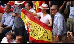 Spanish fans support Rafael Nadal inside Court Philippe Chatrier.