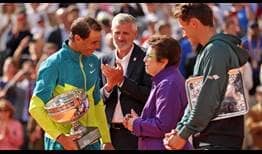 Rafael Nadal accepts the Coupe des Mousquetaires from Billie Jean King.