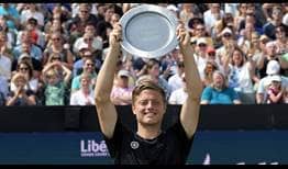 TIm Van Rijthoven lifts his maiden ATP Tour trophy in 's-Hertogenbosch on Sunday.