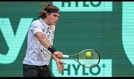 Stefanos Tsitsipas hits 14 aces in a first-round victory in Halle.
