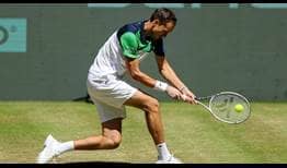 Daniil Medvedev fires a backhand on his way to victory over David Goffin in Halle on Wednesday.