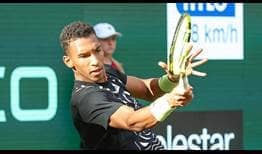 Felix Auger-Aliassime saves a set point in the first-set tie-break against Mackenzie McDonald.