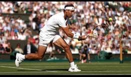 Rafael Nadal defeats Ricardas Berankis in four sets to reach the third round at Wimbledon.