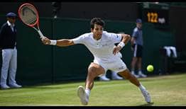 Cristian Garin in action against Alex de Minaur at Wimbledon on Monday.