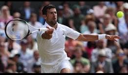 Novak Djokovic fires a forehand in his quarter-final clash with Jannik Sinner at Wimbledon on Tuesday.