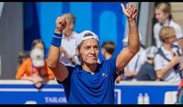 Sebastian Baez celebrates completing his maiden Top 10 win against Andrey Rublev in Bastad on Saturday.