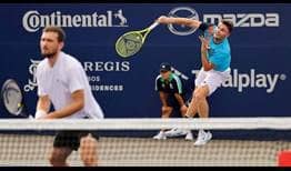 William Blumberg and Miomir Kecmanovic in action in Los Cabos on Monday.