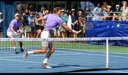Nicolas Mahut (front) and Edouard Roger-Vasselin claw past Jamie Murray and Bruno Soares in a Match Tie-break on Wednesday in Washington.