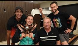 Pablo Carreno Busta and his team celebrate the Spaniard's Montreal title.
